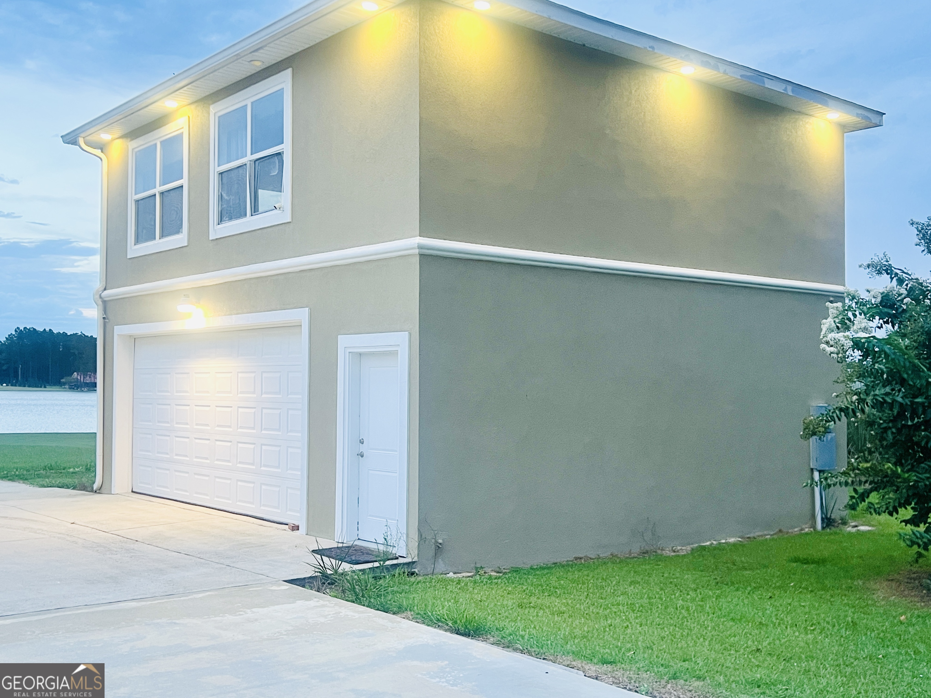 201 Miles Road Bristol, GA 31518 - Photo 45 of 69 a view of yellow house with a yard