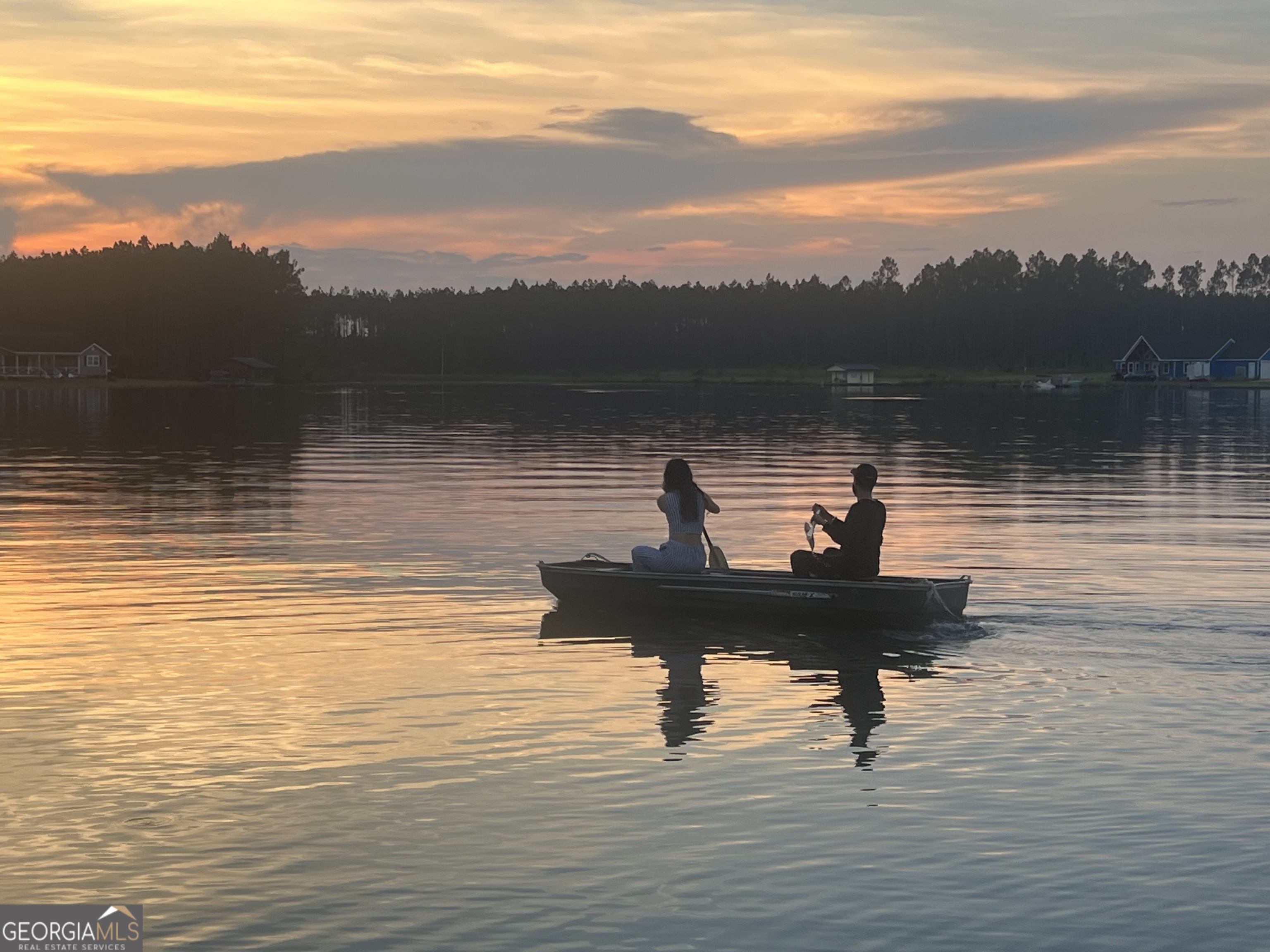201 Miles Road Bristol, GA 31518 - Photo 67 of 69 a view of a lake with a bench