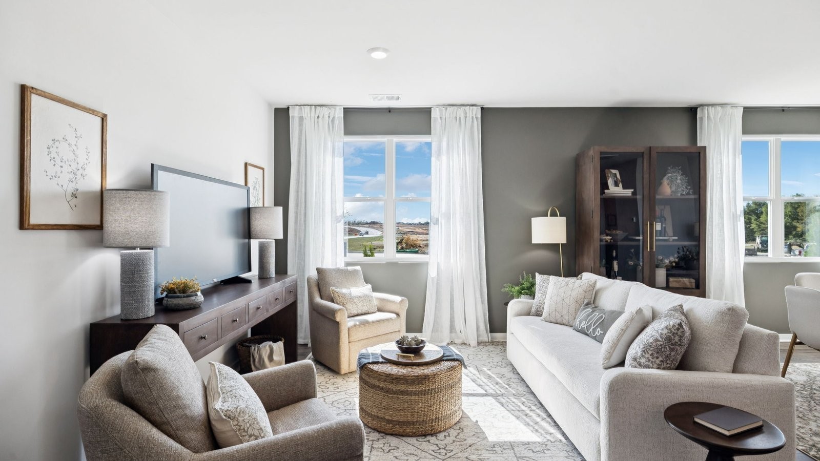 309 Harvest Point Boulevard Spring Hill, TN 37174 - Photo 11 of 46 a living room with furniture and a large window