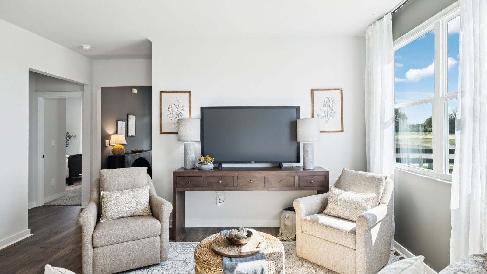 309 Harvest Point Boulevard Spring Hill, TN 37174 - Photo 12 of 46 a living room with furniture and a flat screen tv