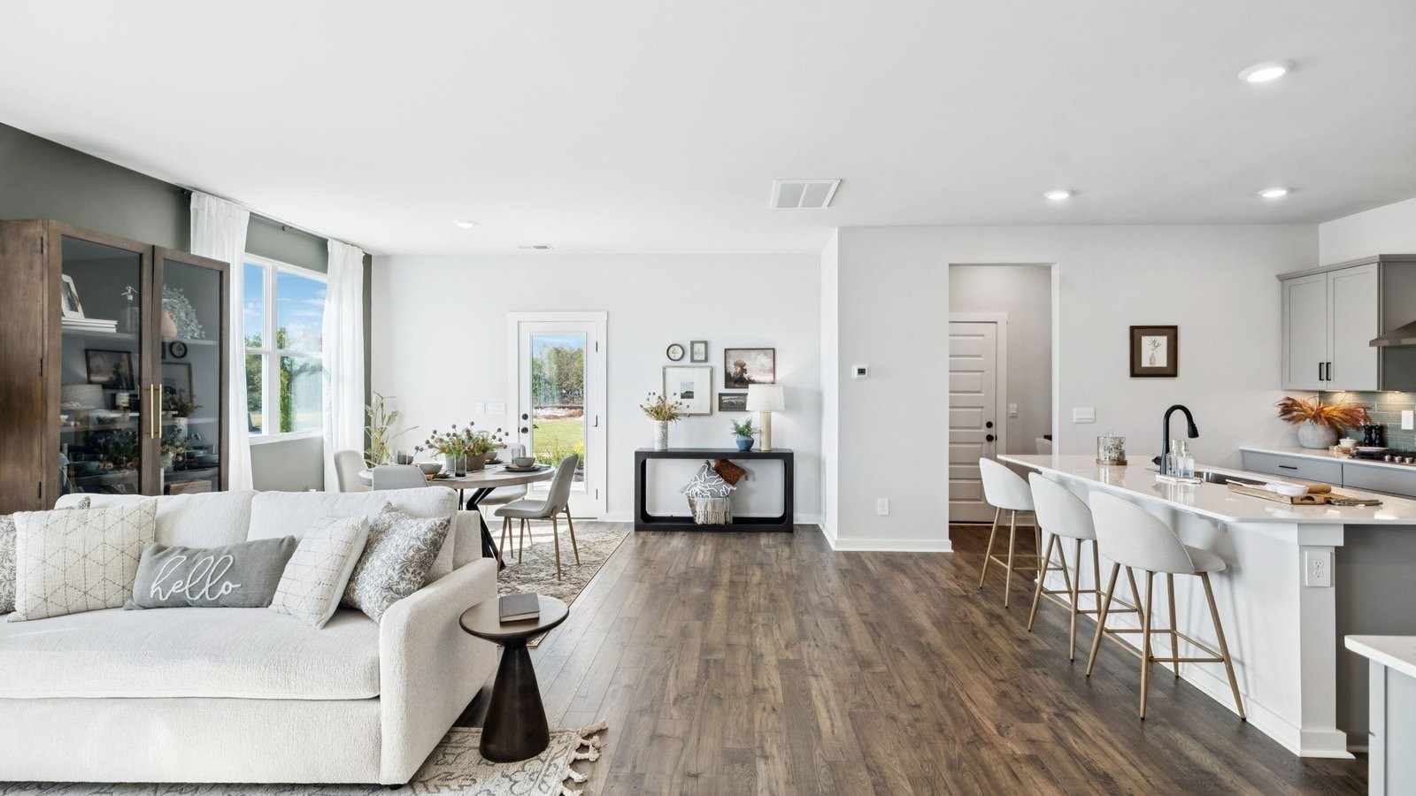 309 Harvest Point Boulevard Spring Hill, TN 37174 - Photo 13 of 46 a living room with furniture and a wooden floor