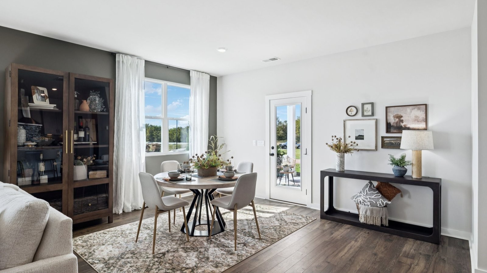 309 Harvest Point Boulevard Spring Hill, TN 37174 - Photo 14 of 46 a living room with furniture and wooden floor