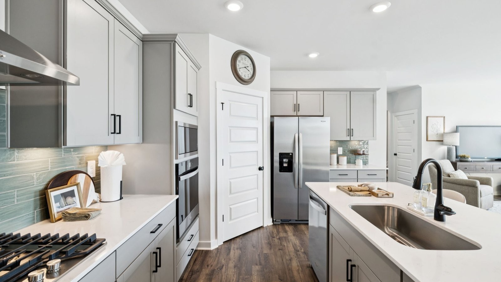 309 Harvest Point Boulevard Spring Hill, TN 37174 - Photo 21 of 46 a kitchen with stainless steel appliances granite countertop a sink stove and refrigerator
