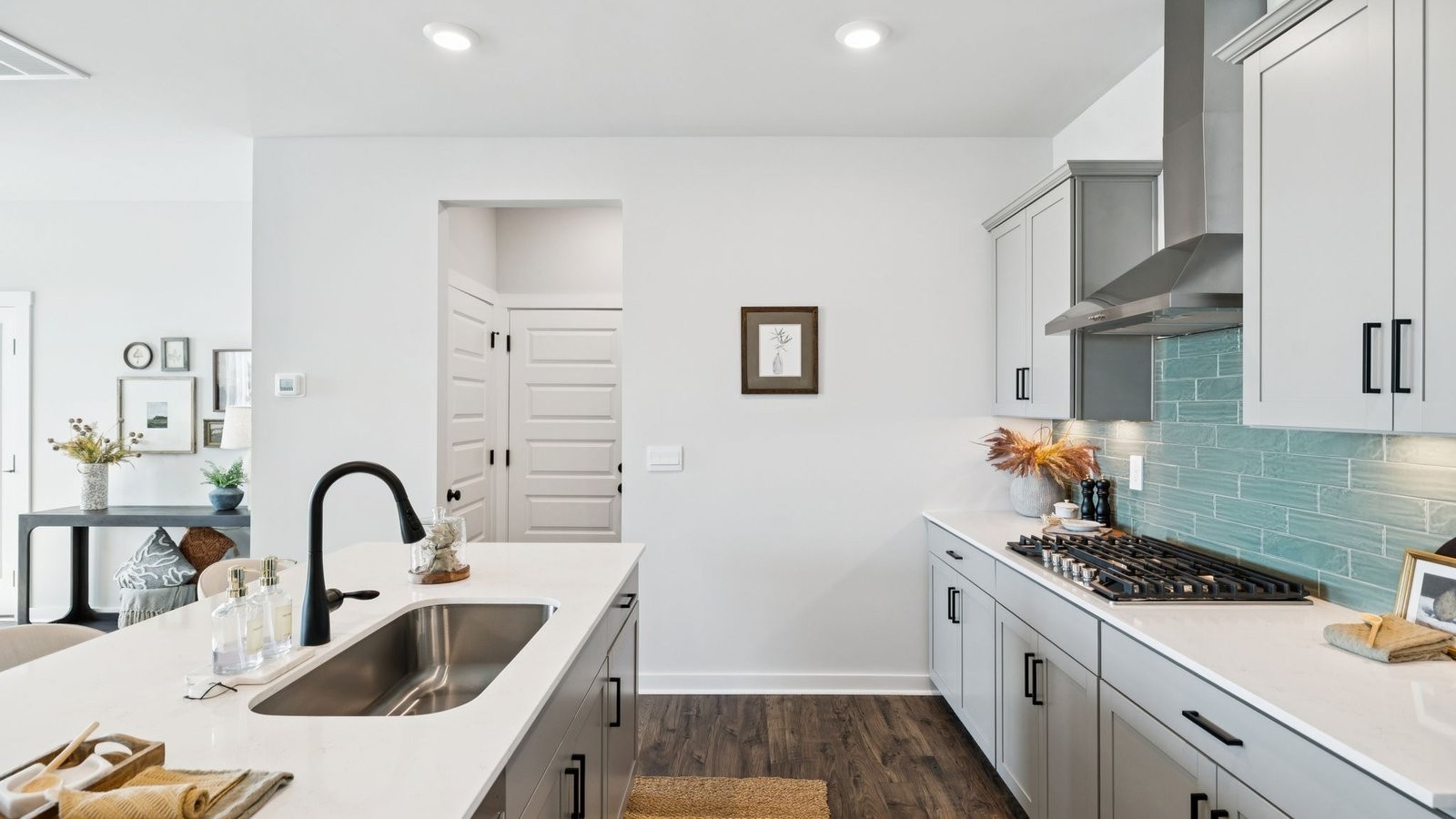 309 Harvest Point Boulevard Spring Hill, TN 37174 - Photo 23 of 46 a kitchen with a sink and cabinets
