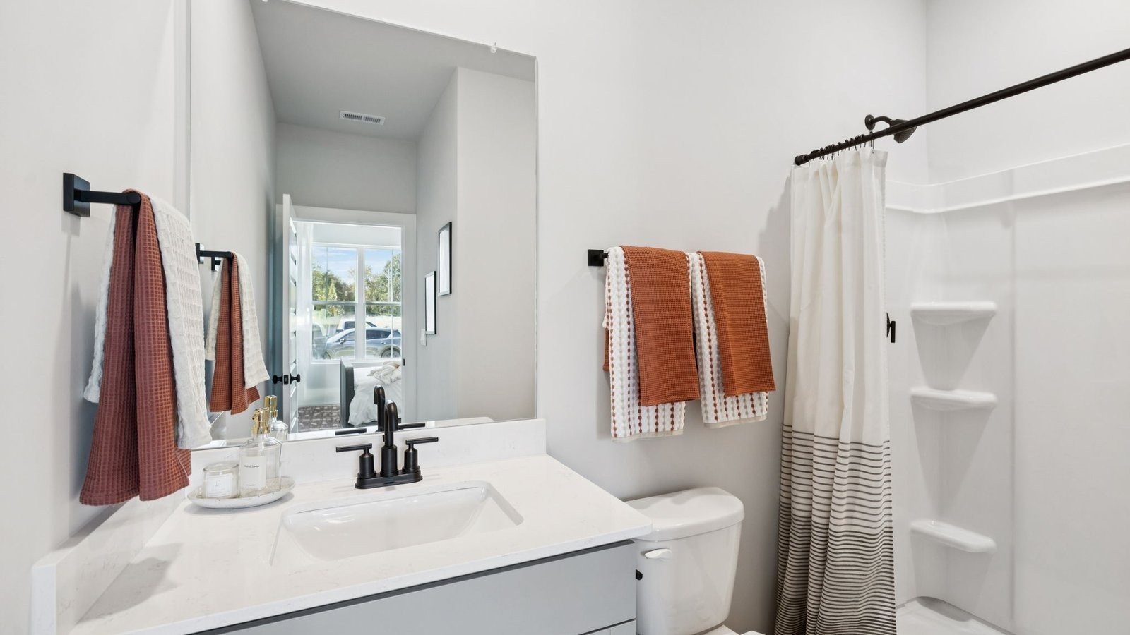309 Harvest Point Boulevard Spring Hill, TN 37174 - Photo 24 of 46 a bathroom with a sink toilet and shower