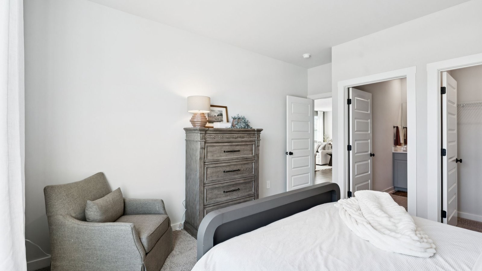 309 Harvest Point Boulevard Spring Hill, TN 37174 - Photo 25 of 46 a bedroom with a bed and furniture