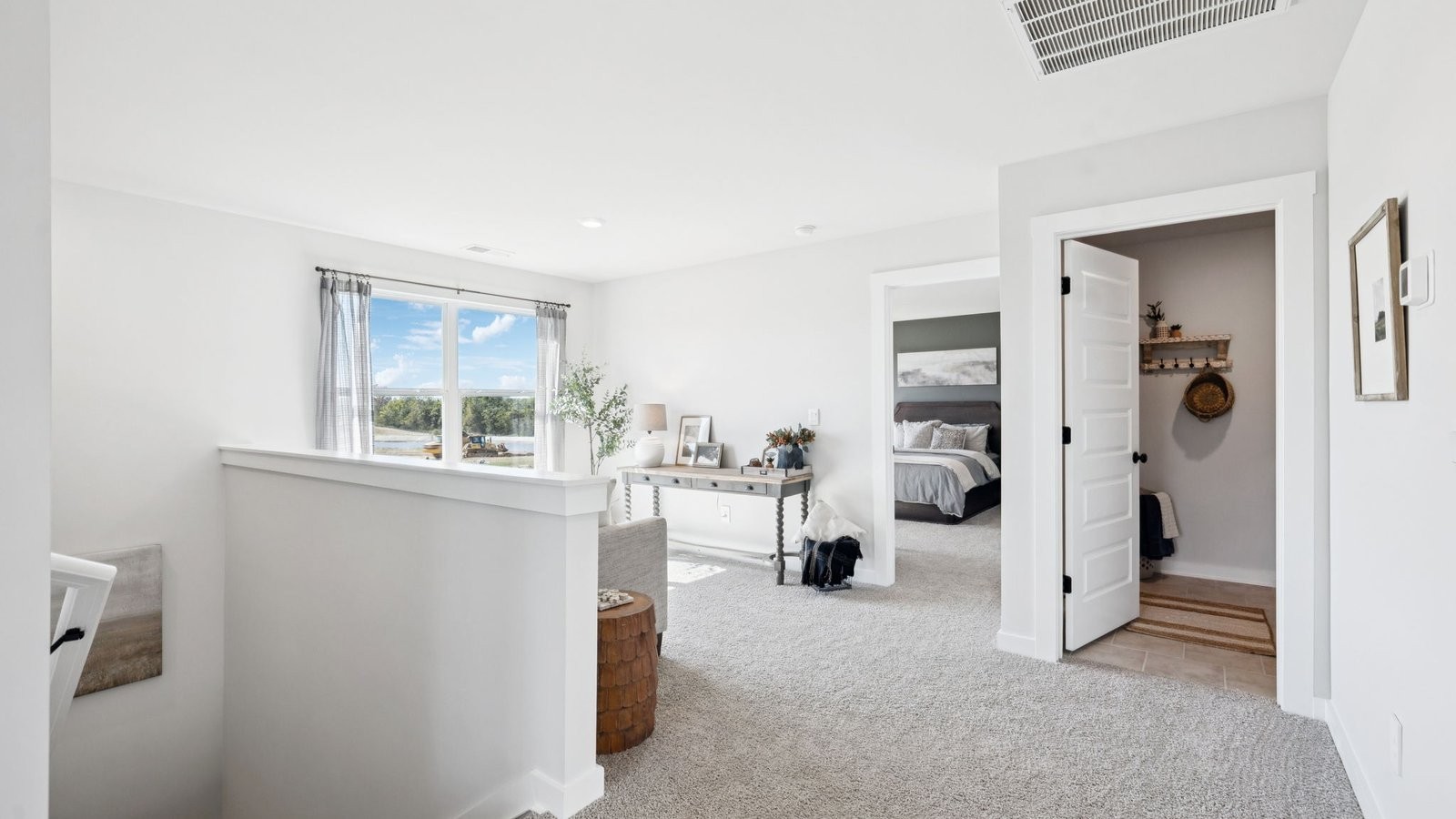 309 Harvest Point Boulevard Spring Hill, TN 37174 - Photo 27 of 46 a view of a living room with furniture and a large window