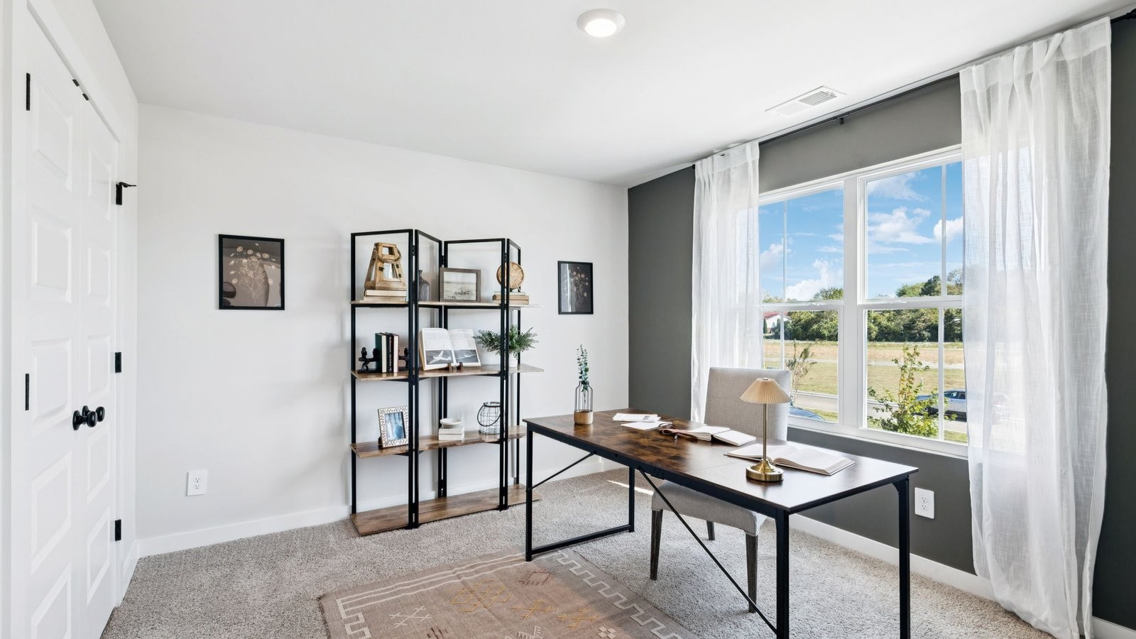 309 Harvest Point Boulevard Spring Hill, TN 37174 - Photo 30 of 46 a view of a workspace with furniture and window