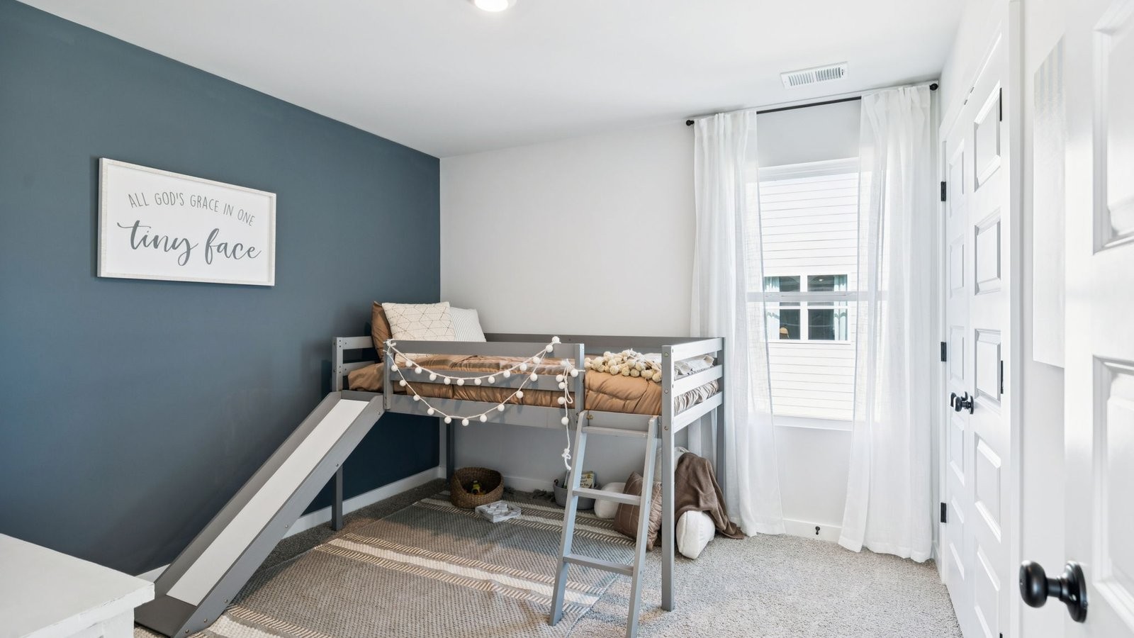 309 Harvest Point Boulevard Spring Hill, TN 37174 - Photo 32 of 46 a room with a table and chairs