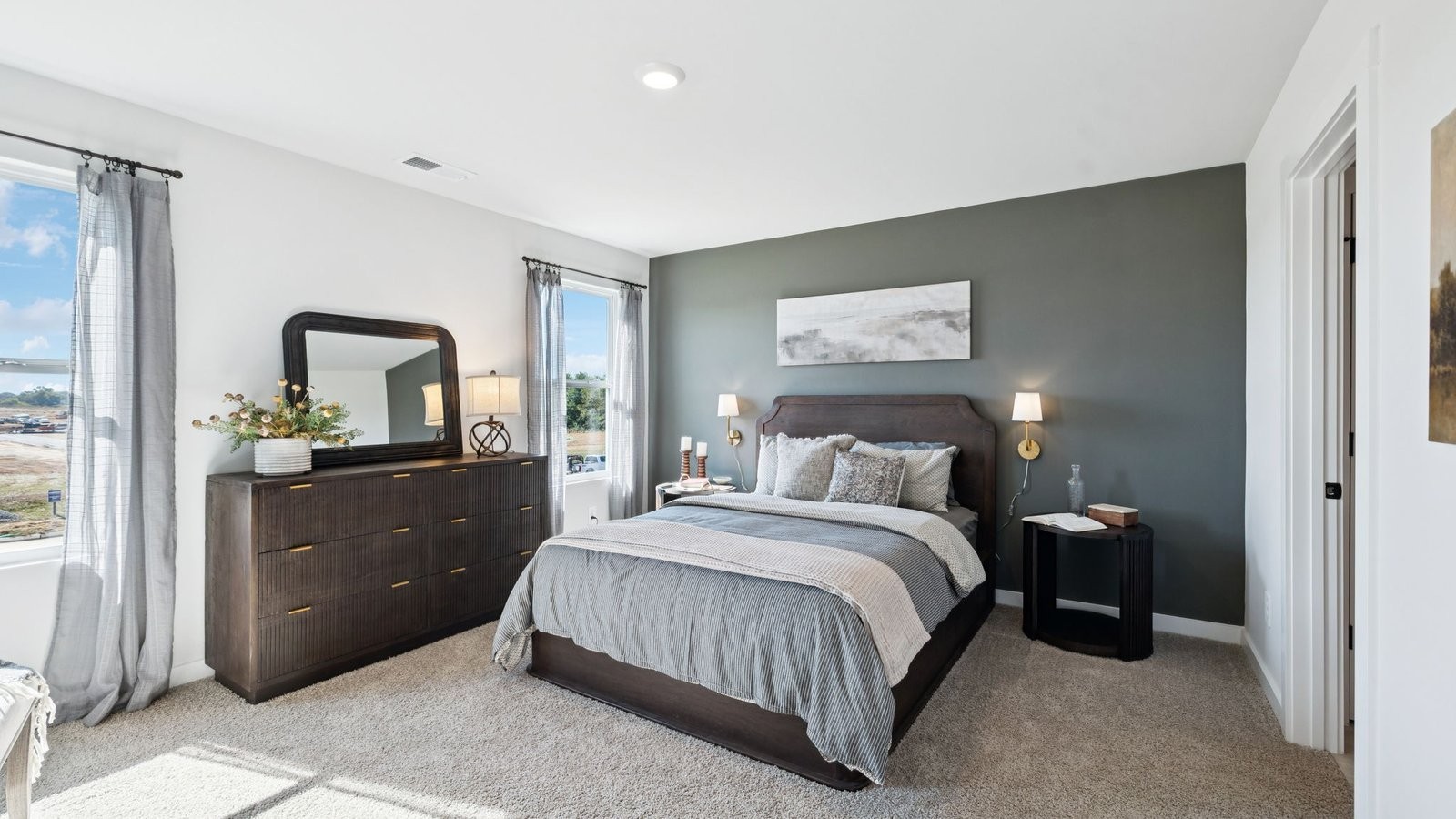 309 Harvest Point Boulevard Spring Hill, TN 37174 - Photo 34 of 46 a bedroom with a bed and a dresser