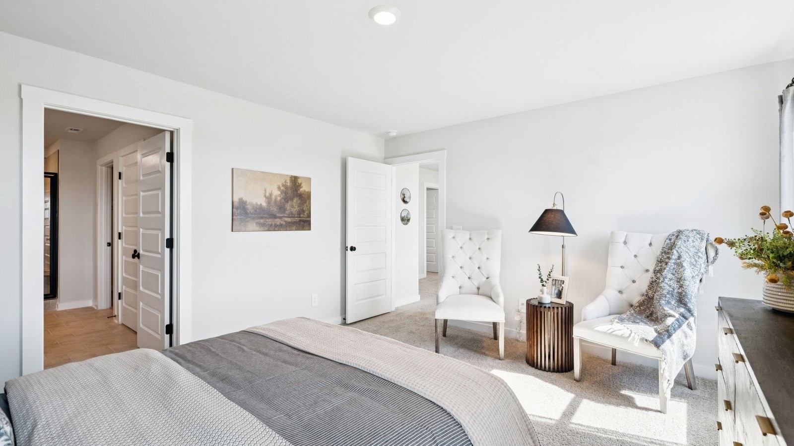 309 Harvest Point Boulevard Spring Hill, TN 37174 - Photo 35 of 46 a bedroom with furniture and a wooden floor