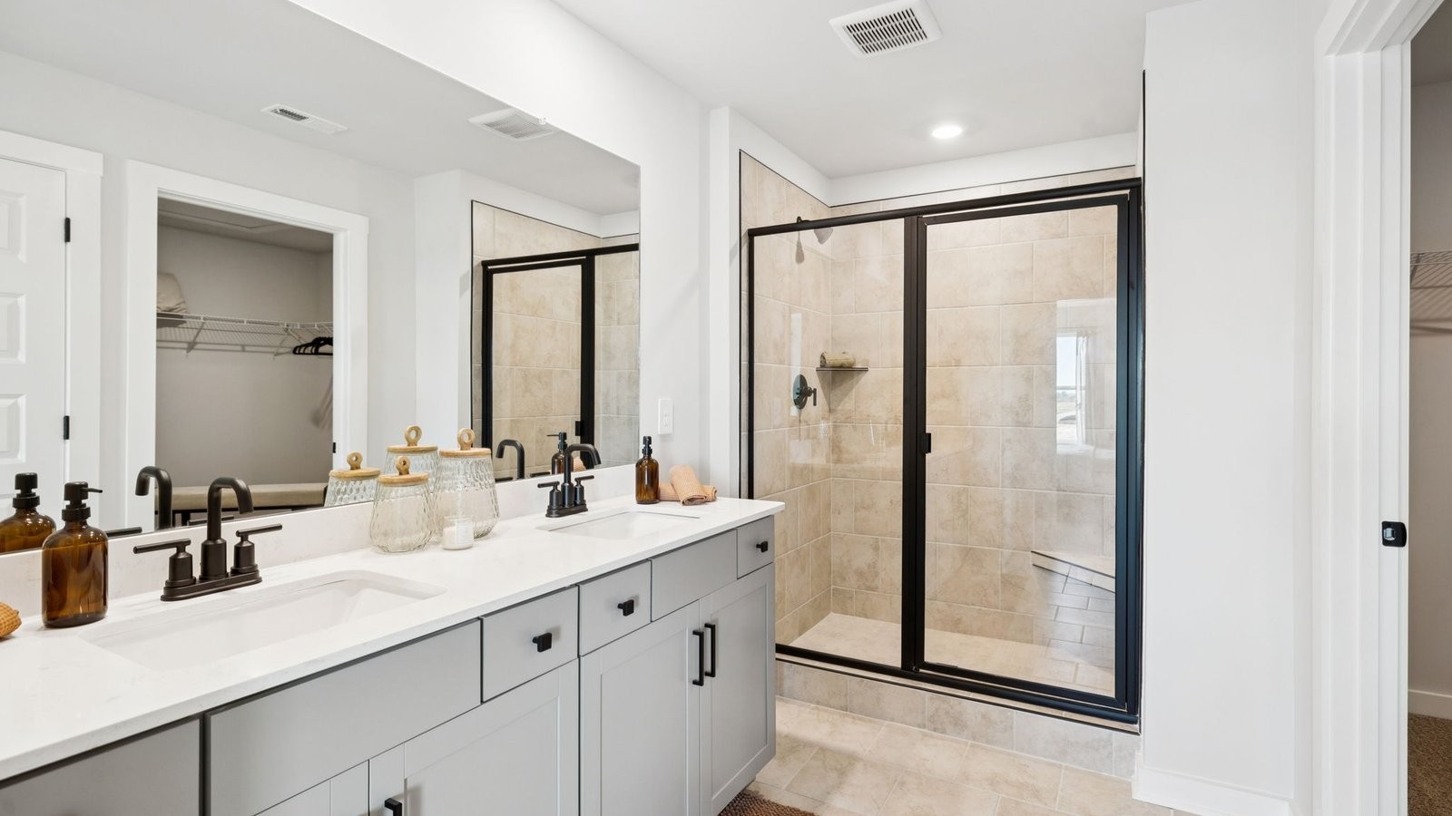 309 Harvest Point Boulevard Spring Hill, TN 37174 - Photo 36 of 46 a bathroom with a double vanity sink mirror and double