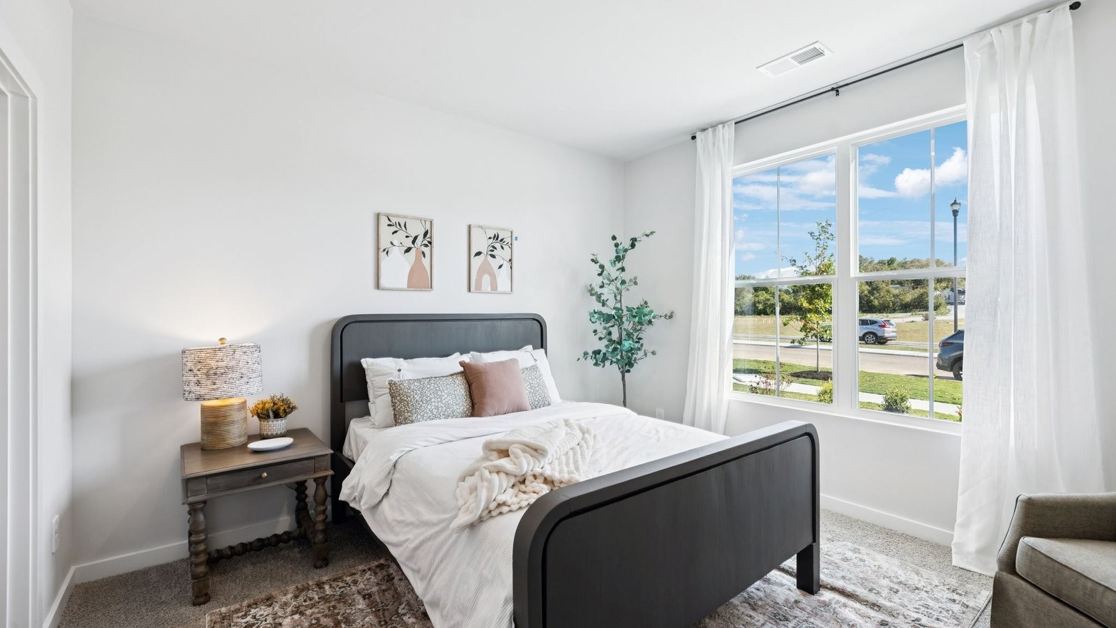 309 Harvest Point Boulevard Spring Hill, TN 37174 - Photo 39 of 46 a bedroom with a bed and a window