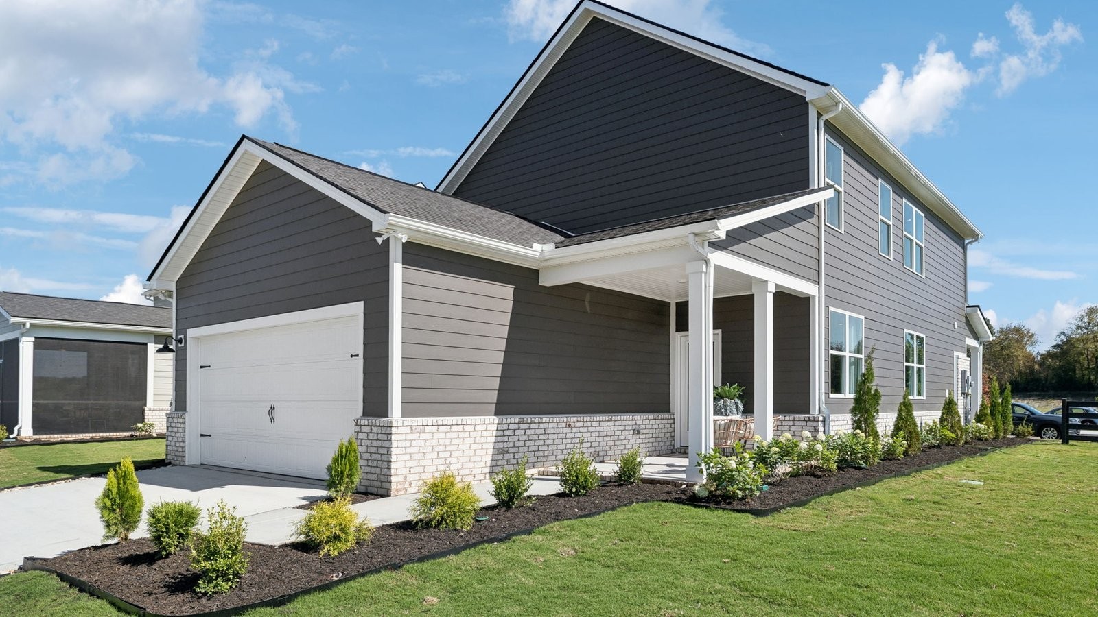 309 Harvest Point Boulevard Spring Hill, TN 37174 - Photo 42 of 46 a front view of house with yard