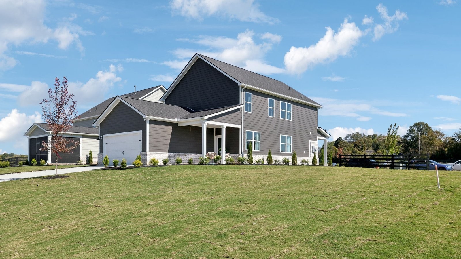 309 Harvest Point Boulevard Spring Hill, TN 37174 - Photo 46 of 46 a front view of a house with a yard