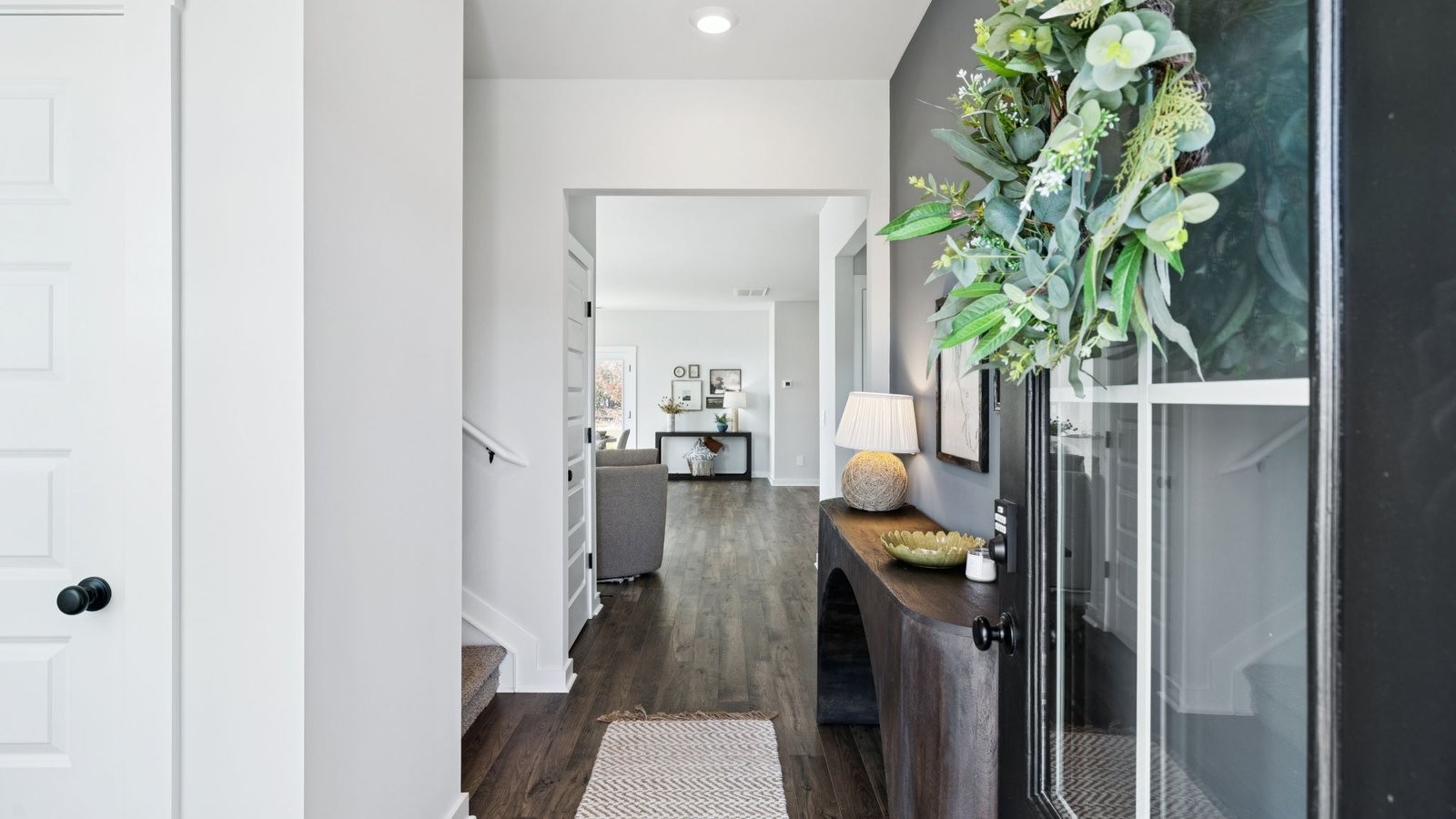 309 Harvest Point Boulevard Spring Hill, TN 37174 - Photo 8 of 46 a living room with furniture and a potted plant