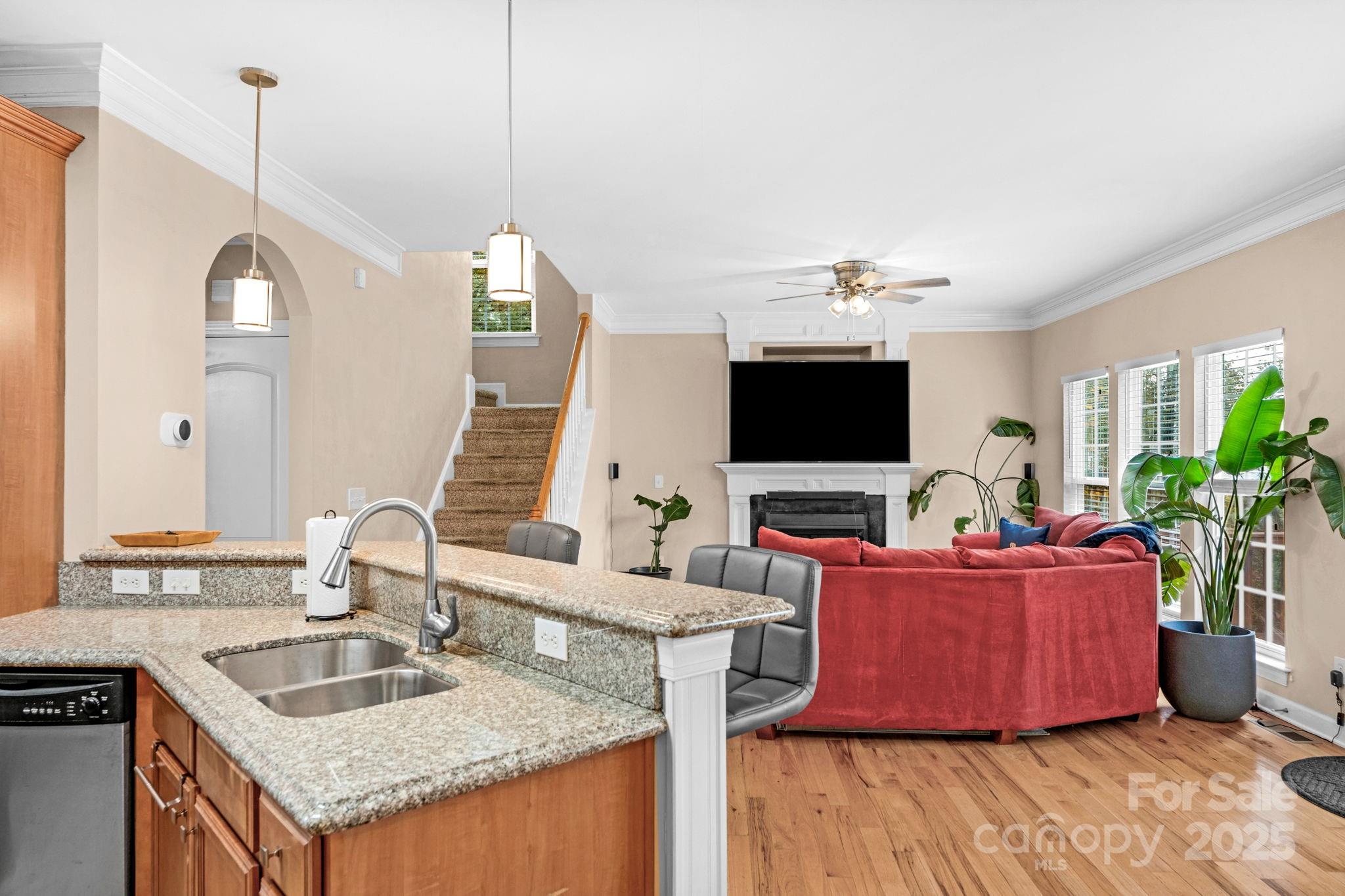 2805 Cross Tie Lane Matthews, NC 28105 - Photo 9 of 42 a living room with furniture and a flat screen tv