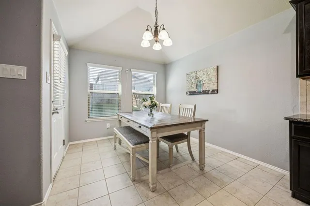 a workspace with furniture and window