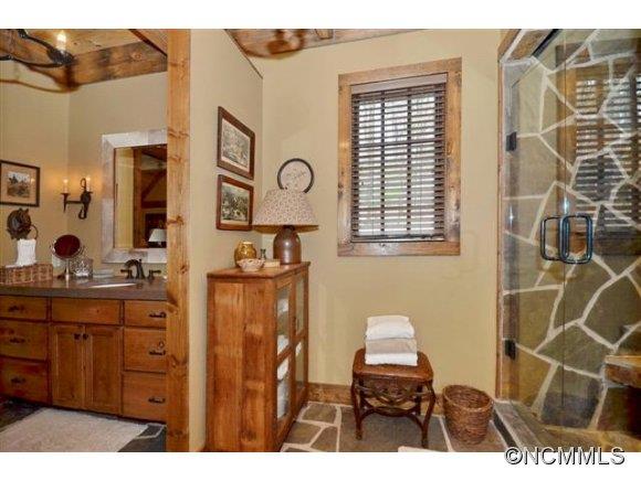 296 Broad Oaks Lane Rutherfordton, NC 28139 - Photo 12 of 19 a hallway with a large window and cabinets