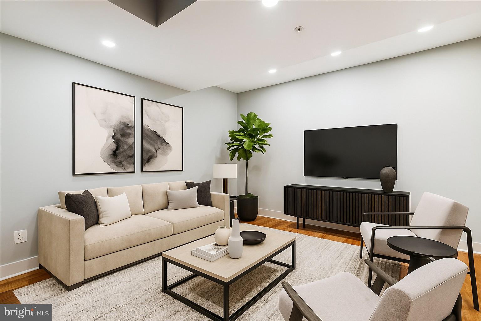3404 13th Street Northwest, Unit 102 Washington, DC 20010 - Photo 16 of 29 a living room with furniture and a flat screen tv