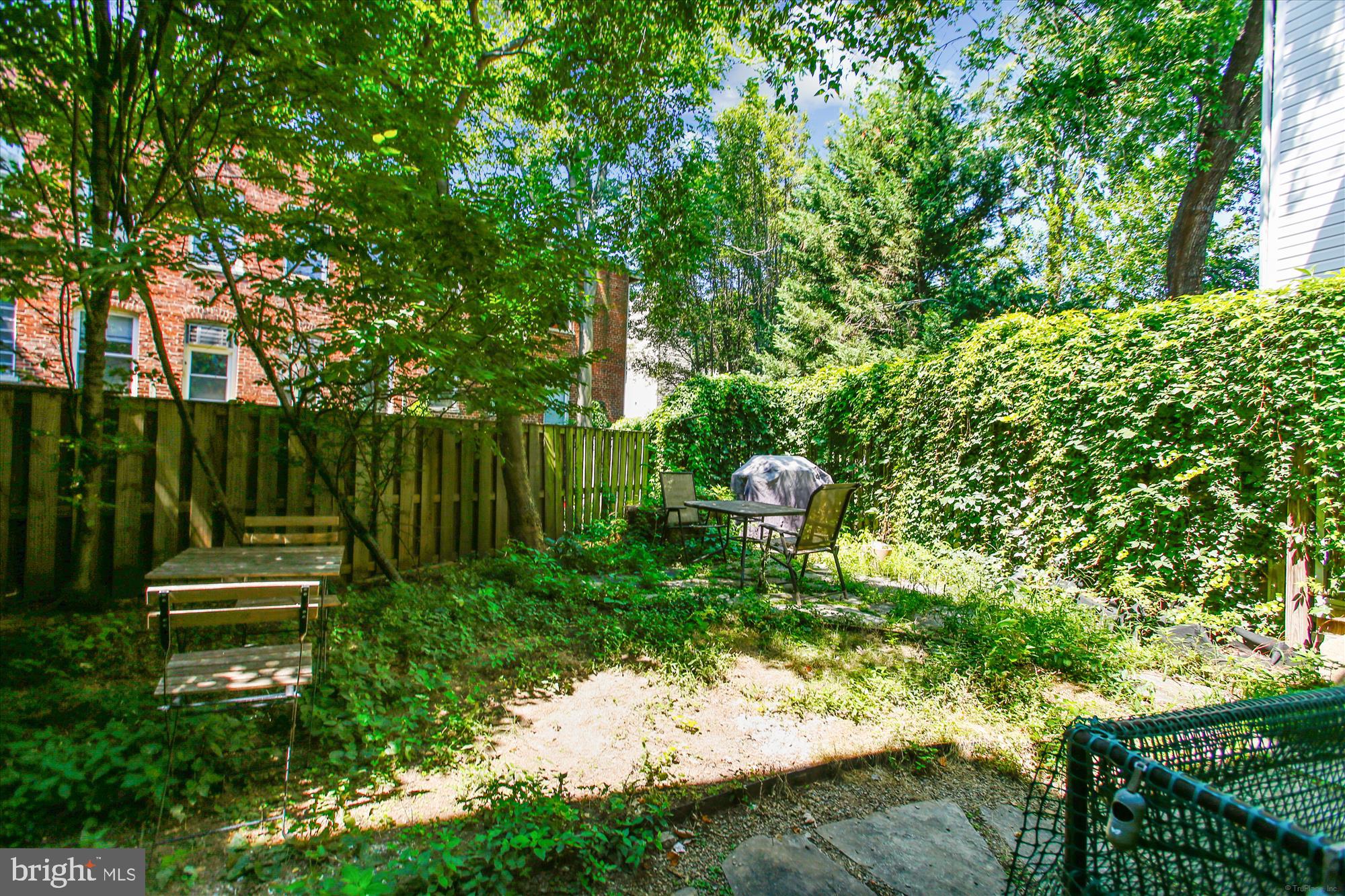 3404 13th Street Northwest, Unit 102 Washington, DC 20010 - Photo 21 of 29 a view of backyard with a garden and outdoor seating