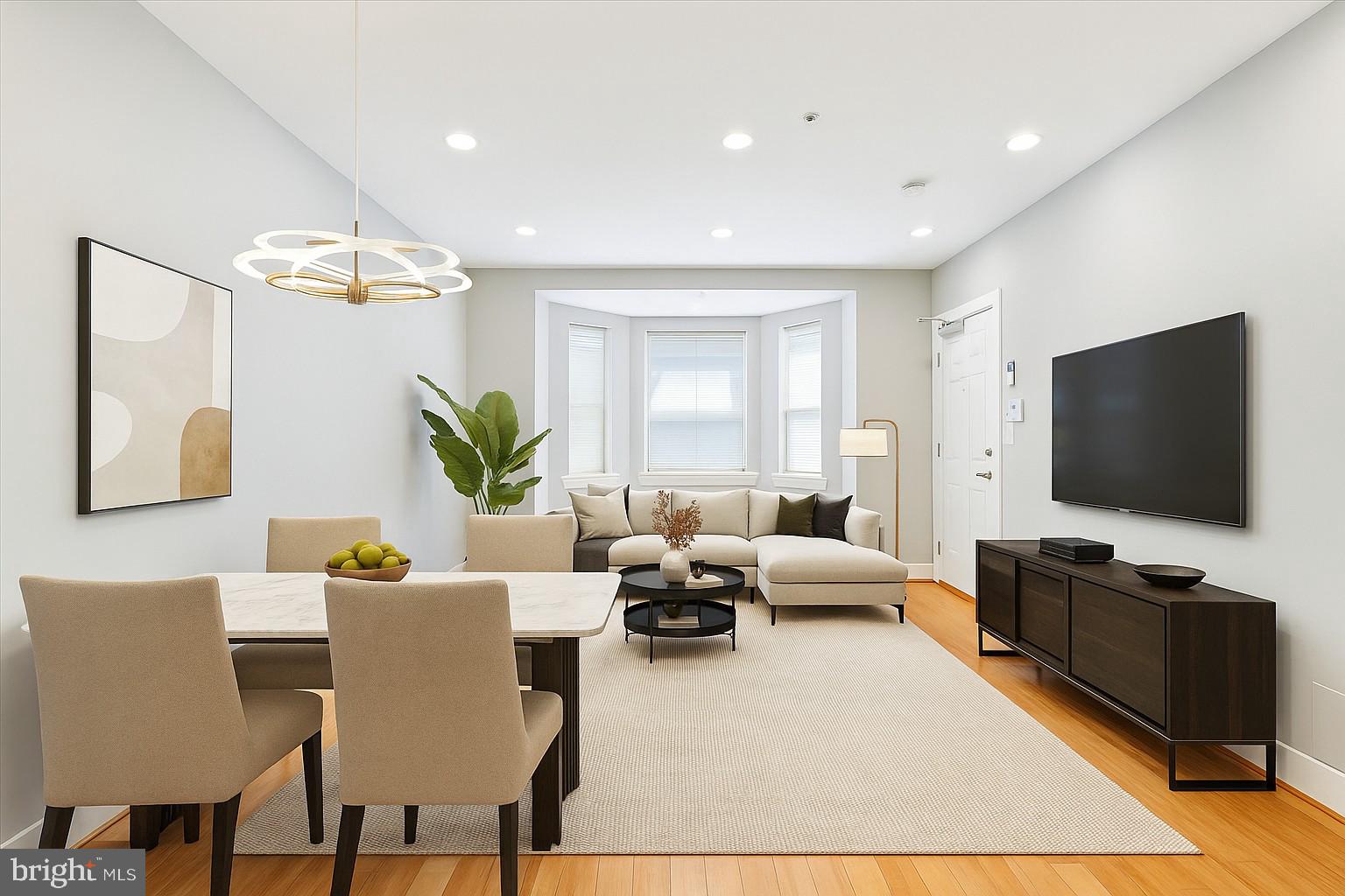 3404 13th Street Northwest, Unit 102 Washington, DC 20010 - Photo 3 of 29 a living room with furniture and a flat screen tv