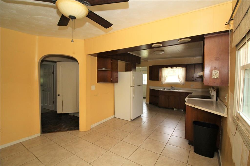 1456 Rte 481 Charleroi, PA 15022 - Photo 2 of 25 Awesome Kitchen 13x8 with 12x5 Dining Area Finished with Ceiling Fan. Ceramic Tile Flooring, Overhead Lighting, Wooden Cabinets, and Formica Counter tops.