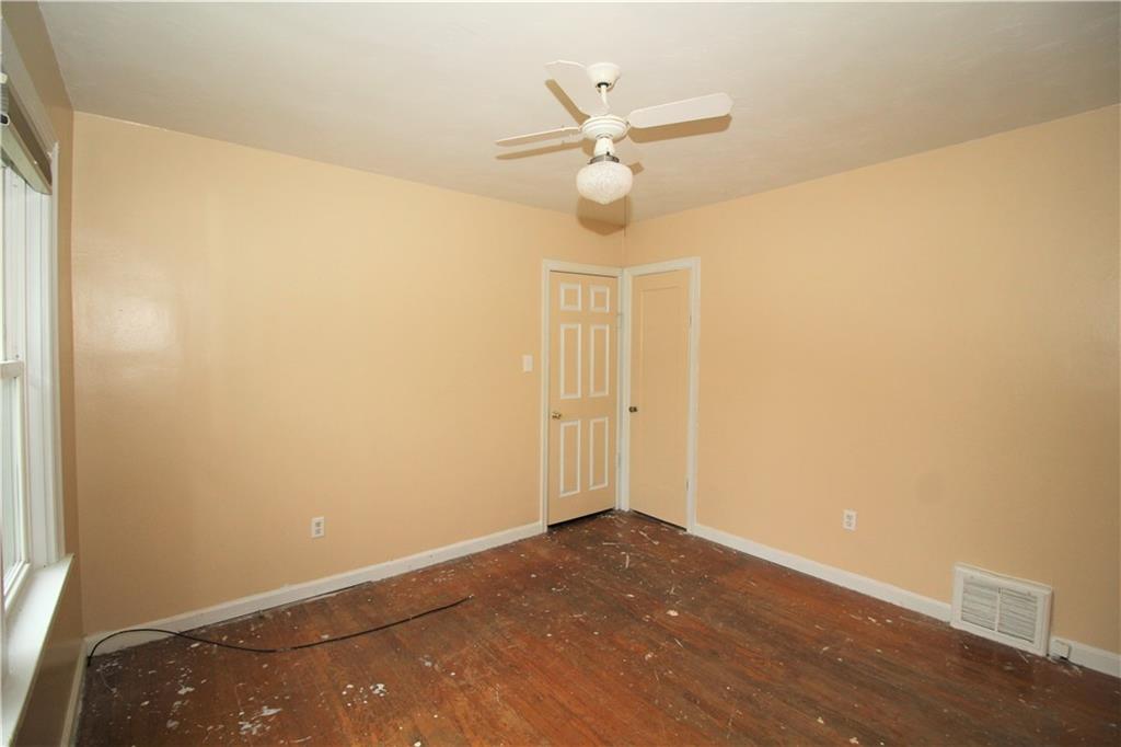 1456 Rte 481 Charleroi, PA 15022 - Photo 5 of 25 The Master Bedroom is 11x11 and has a Ceiling Fan, Deep Closet, Hardwood Floor and Wooden Door & Baseboard trim, Two Windows, and Cable Hookup.