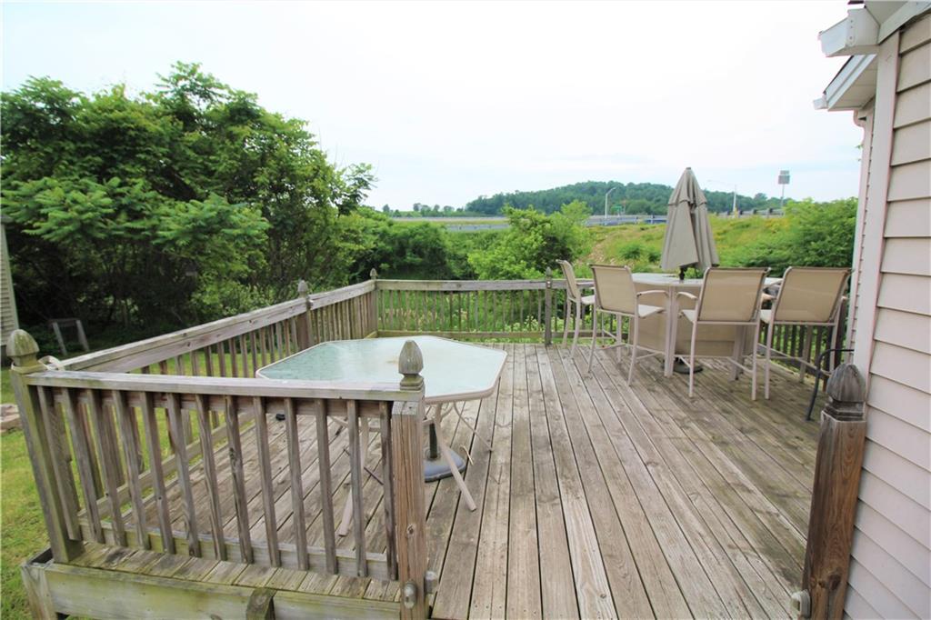 1456 Rte 481 Charleroi, PA 15022 - Photo 7 of 25 Nice Wooden Deck has Plenty of Space for Patio Furniture and Offers a Nice Spot to Enjoy Nature.