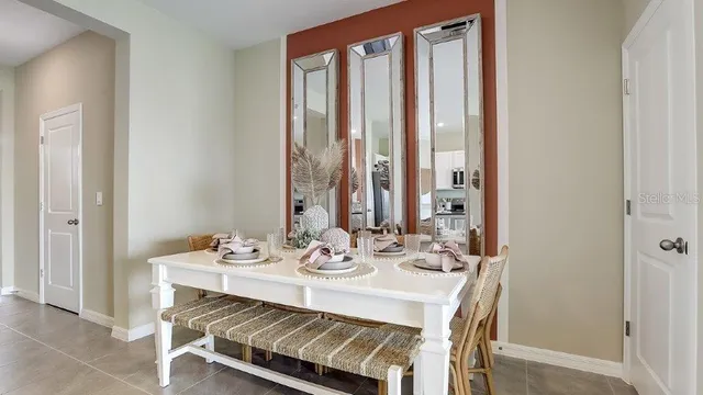 a kitchen with a sink a stove a microwave and cabinets