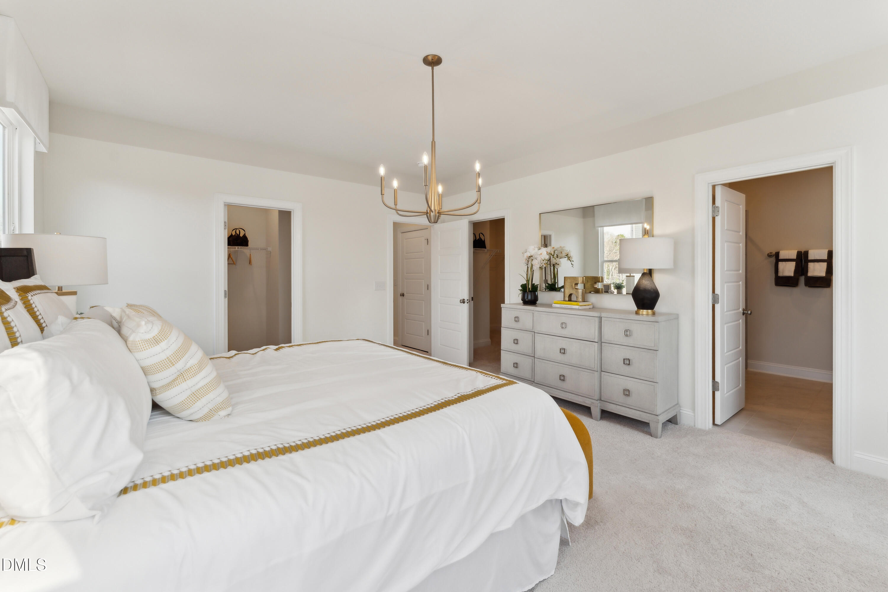 10610 Pleasant Branch Drive Raleigh, NC 27614 - Photo 12 of 34 a spacious bedroom with a bed and a dresser