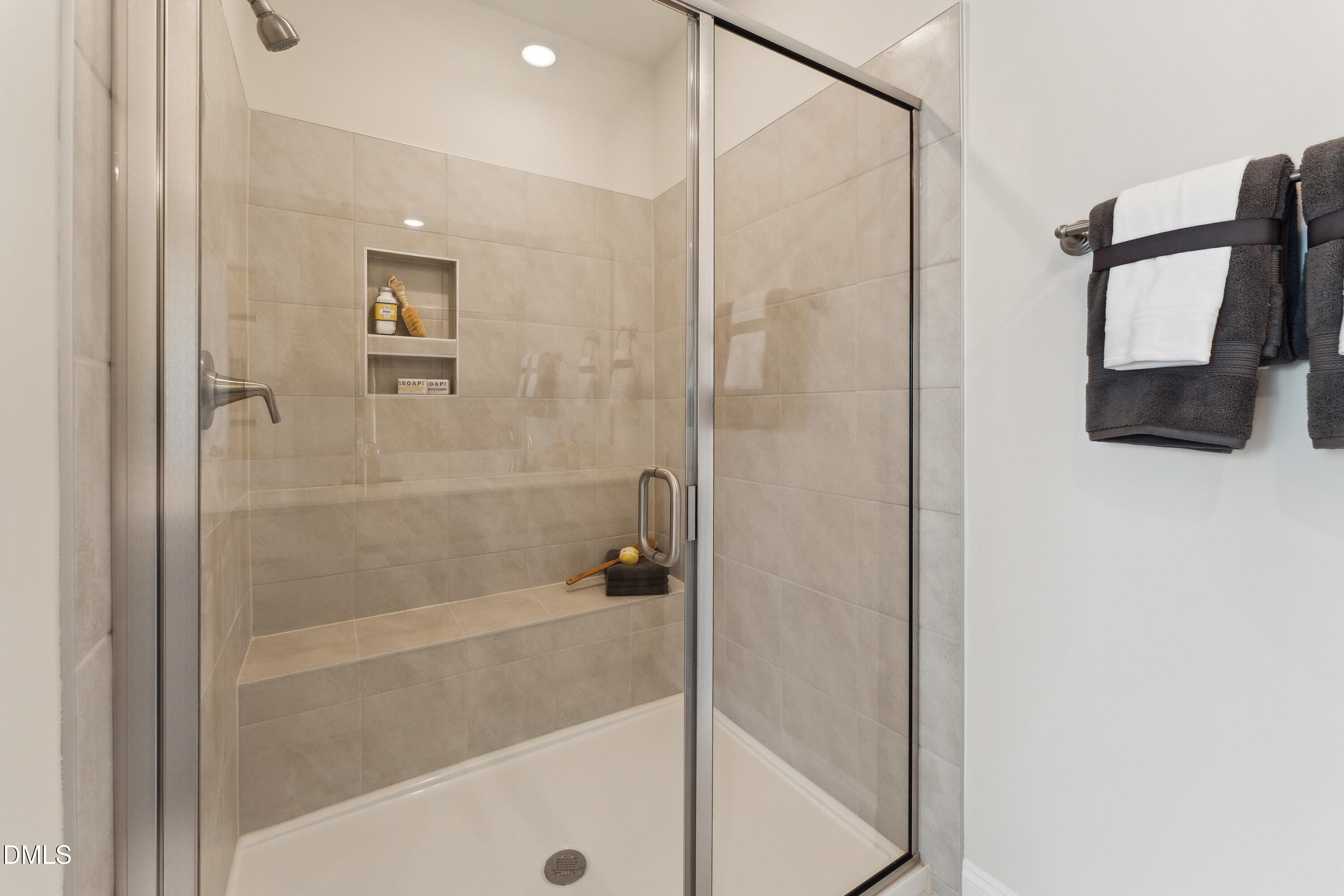 10610 Pleasant Branch Drive Raleigh, NC 27614 - Photo 14 of 34 a bathroom with a shower and a sink