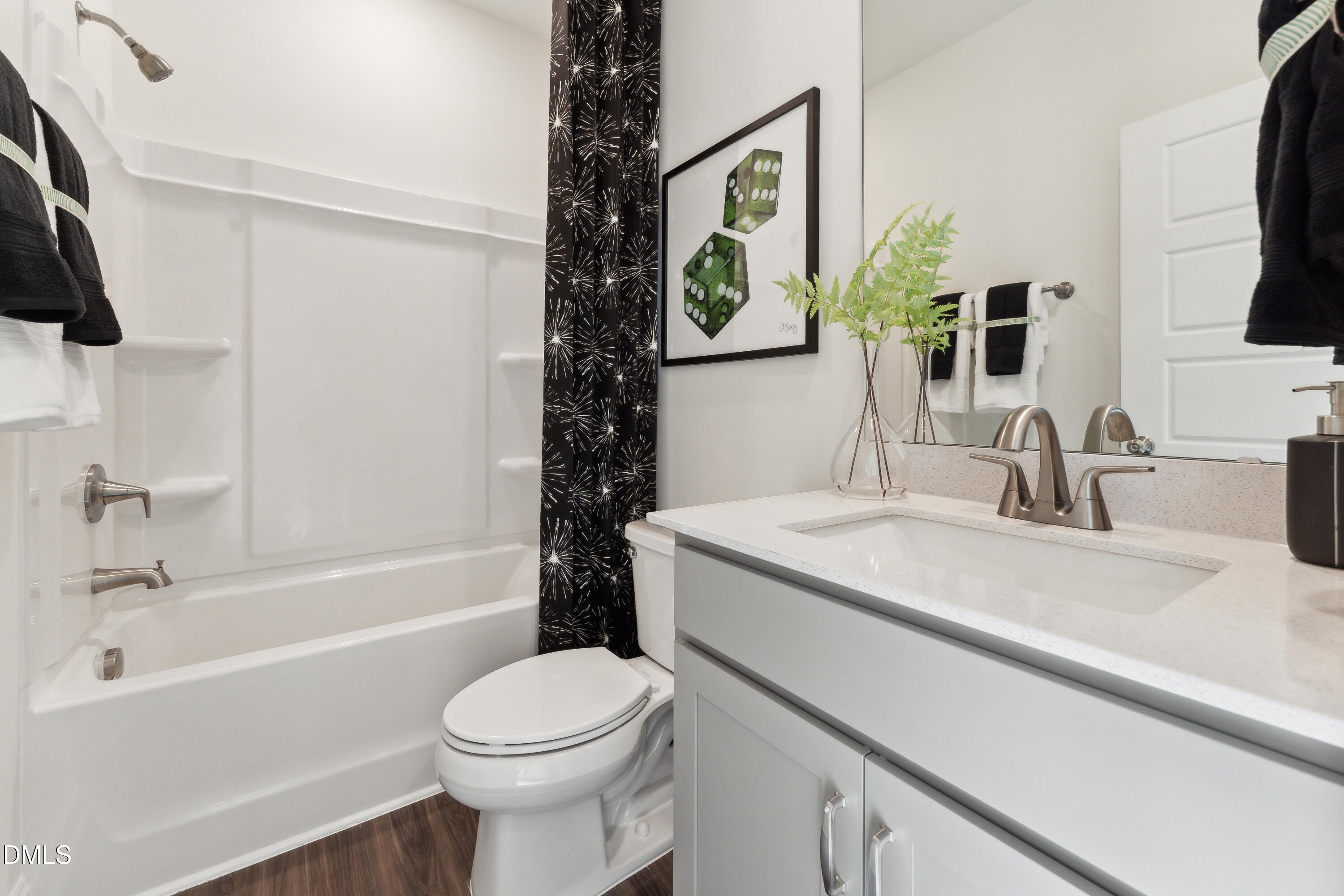 10610 Pleasant Branch Drive Raleigh, NC 27614 - Photo 17 of 34 a bathroom with a granite countertop sink toilet and shower