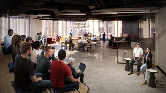 a group of people sitting in a room