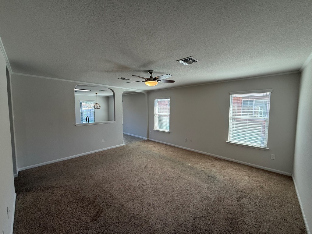 206 Windridge Drive North Lockhart, TX 78644 - Photo 3 of 20 a view of an empty room with a window