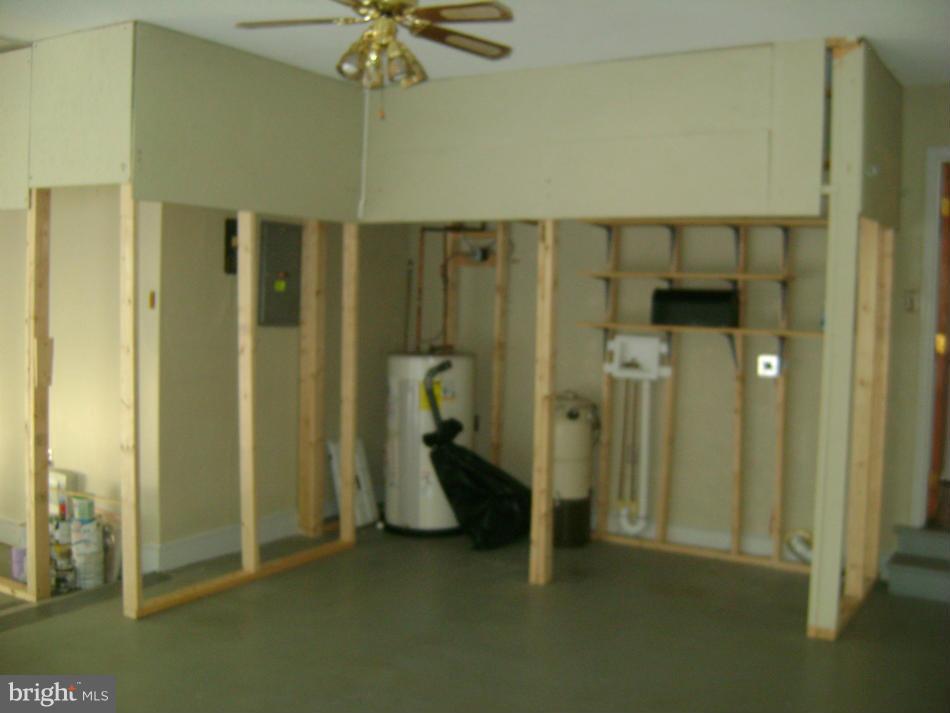 11906 Fort Washington Road Fort Washington, MD 20744 - Photo 8 of 30 Garage area with HWH and Electric panel