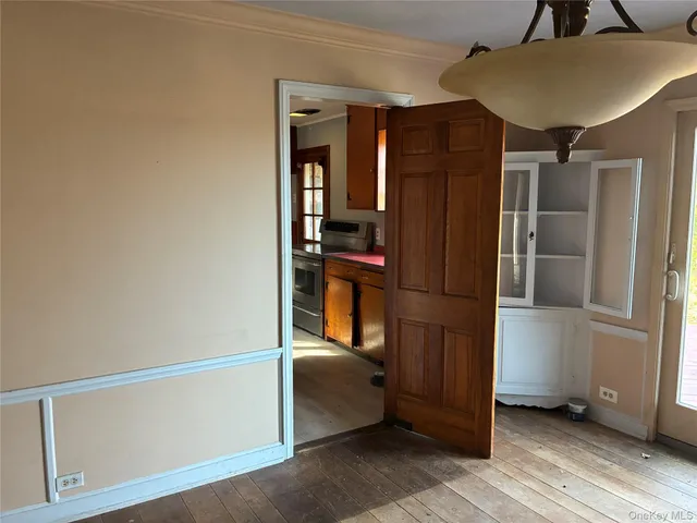 a kitchen with stainless steel appliances a refrigerator and cabinets