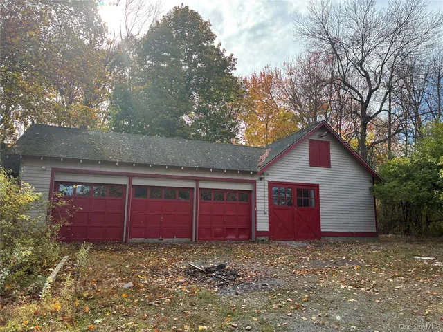 a house with red gate