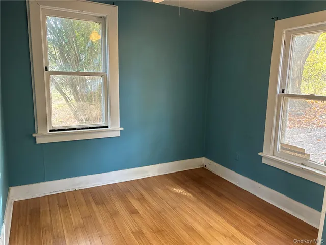 a view of a room that has a window in it