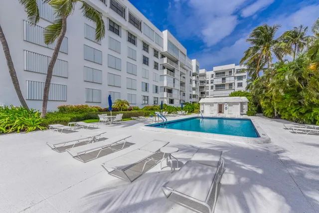 a view of tall buildings in the background