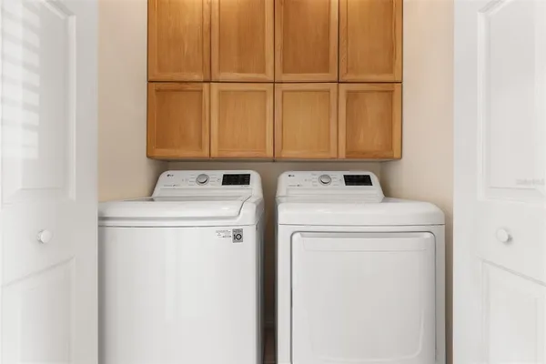 a utility room with dryer and washer