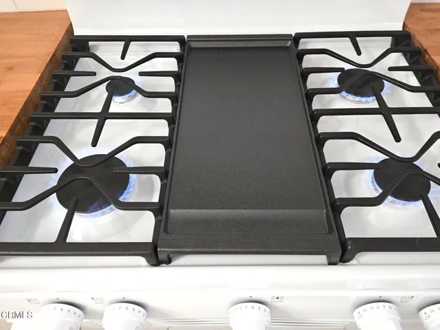 a view of an empty room and a window