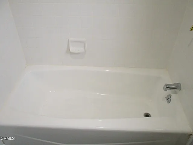 an empty room with a door