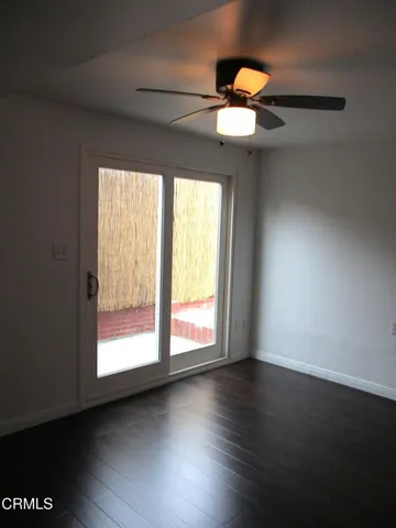 a view of a glass door of a house