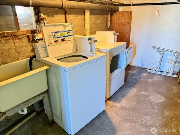 a utility room with dryer and washer