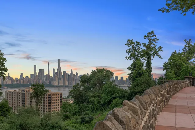 a view of a city with tall buildings in the background