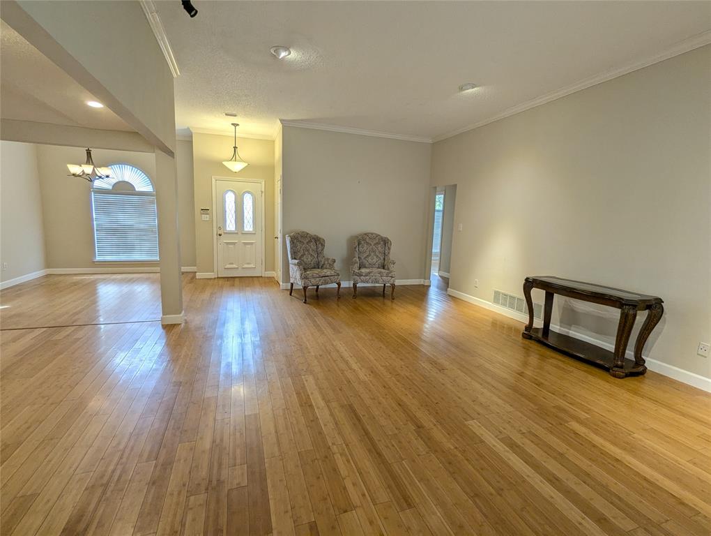 6019 Mapleshade Lane Dallas, TX 75252 - Photo 2 of 14 a view of livingroom with furniture and wooden floor