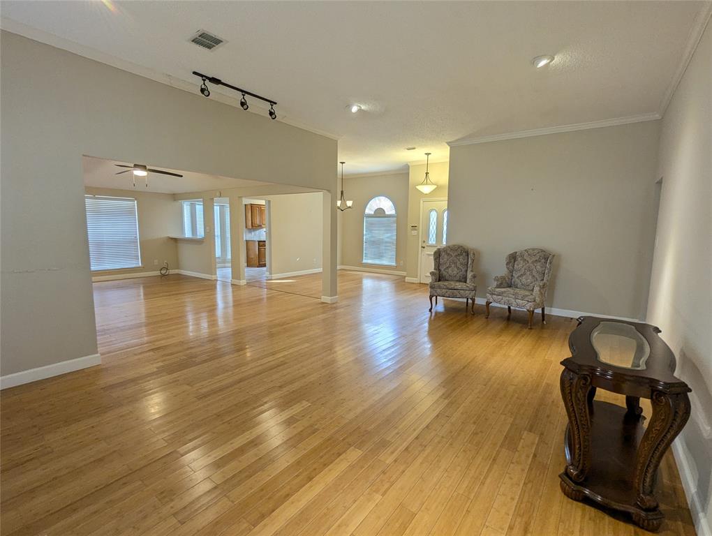 6019 Mapleshade Lane Dallas, TX 75252 - Photo 14 of 14 a view of a room with gym equipment