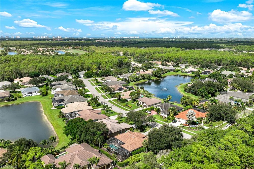 3960 Deep Passage Way Naples, FL 34109 - Photo 33 of 34 Aerial view of residential area.