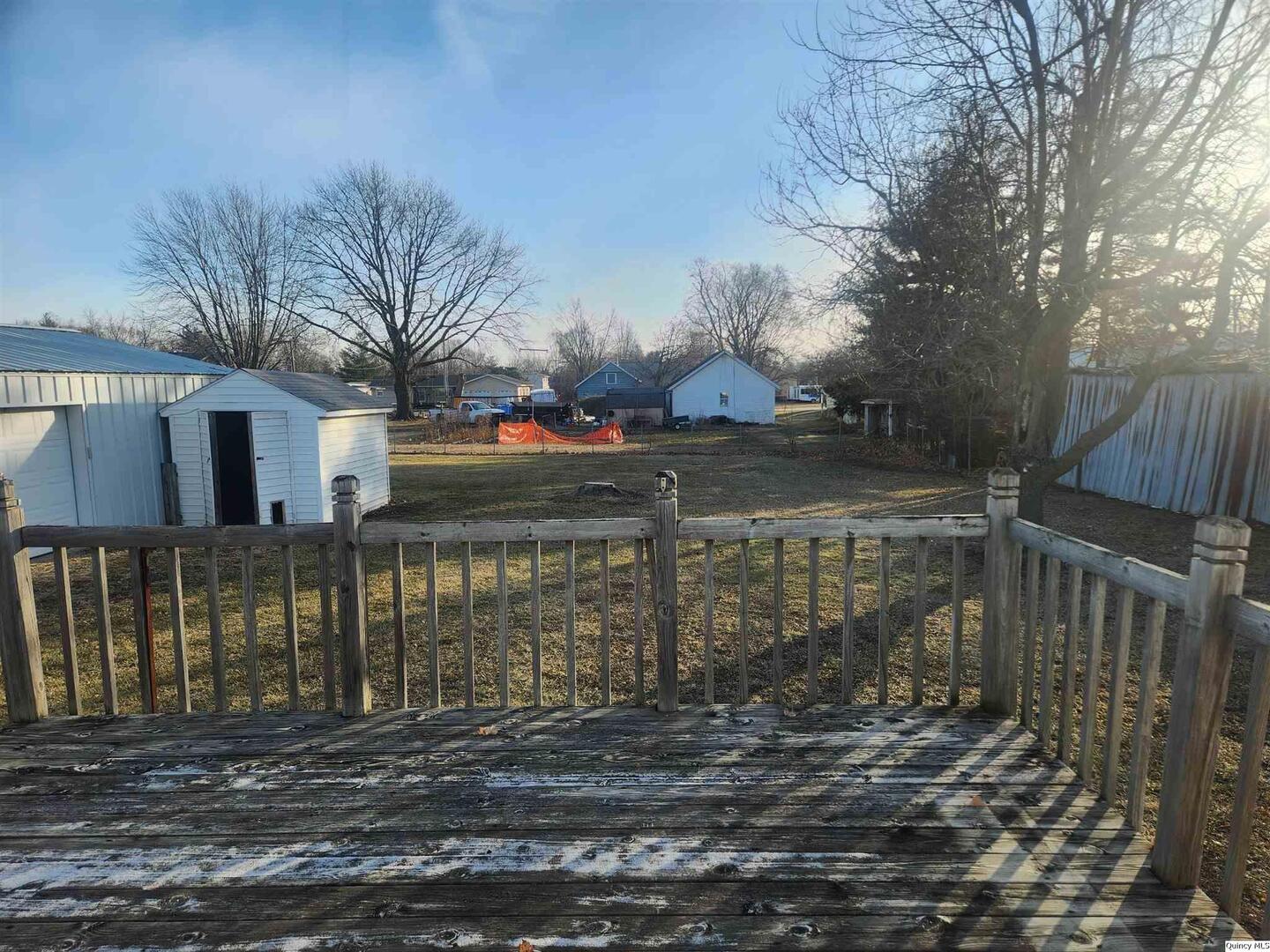 228 North Madison Street Carthage, IL 62321 - Photo 15 of 19 a view of a house with a yard